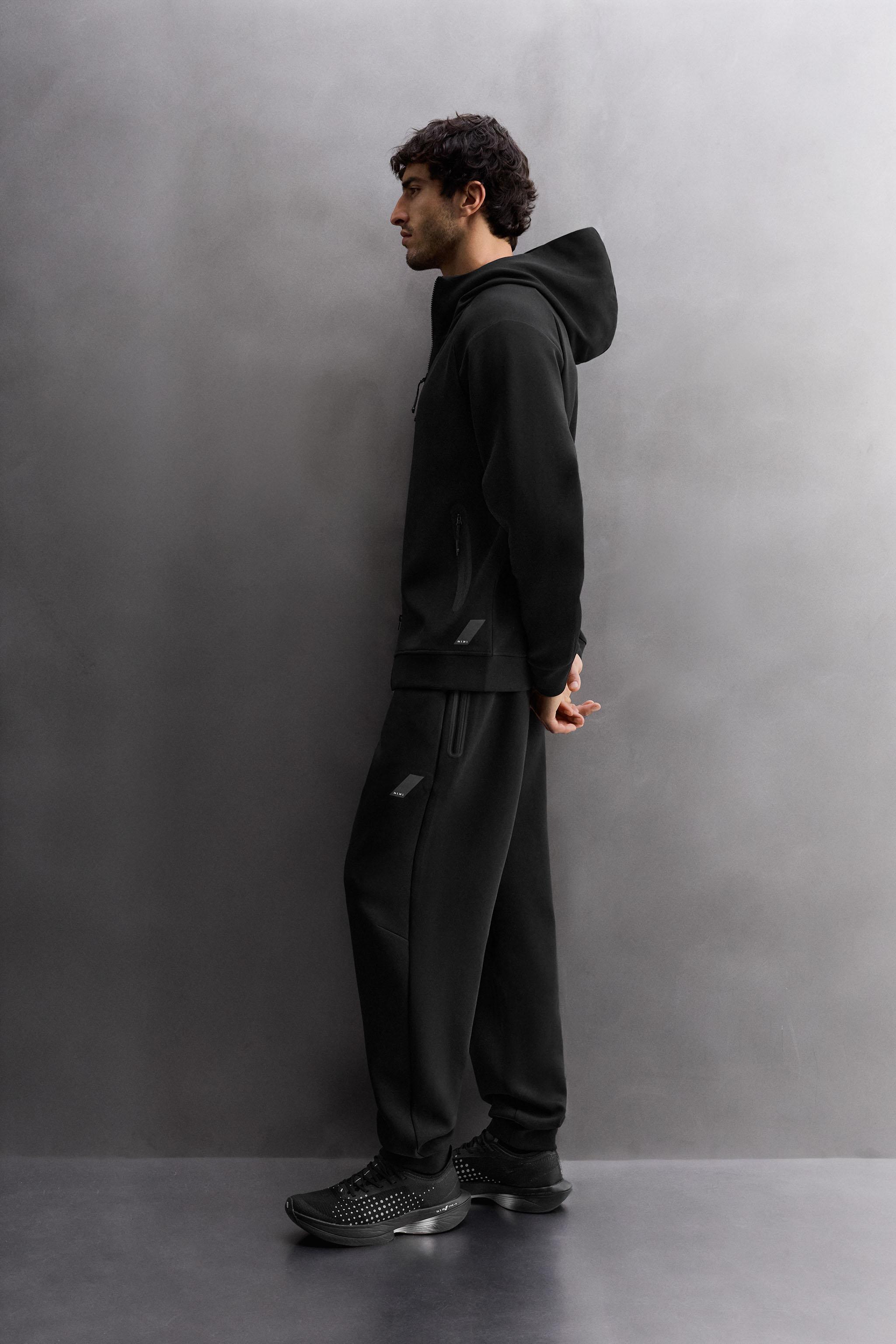 TECHNICAL PANTS WITH ZIPPER